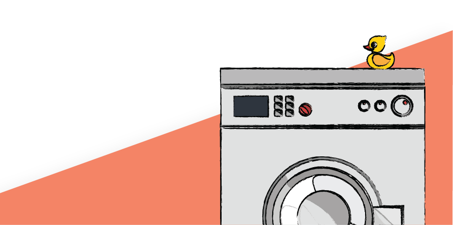 Image of a tumble dryer with a rubber duck on top, showcasing one of the kitchen appliances we cover