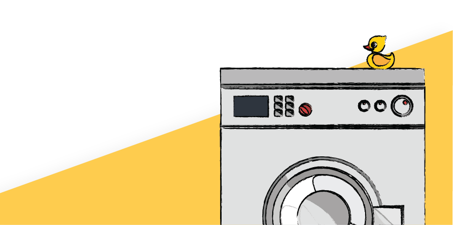 Image of a washing machine with a cat and laundry basket on top, showcasing one of the kitchen appliances we cover